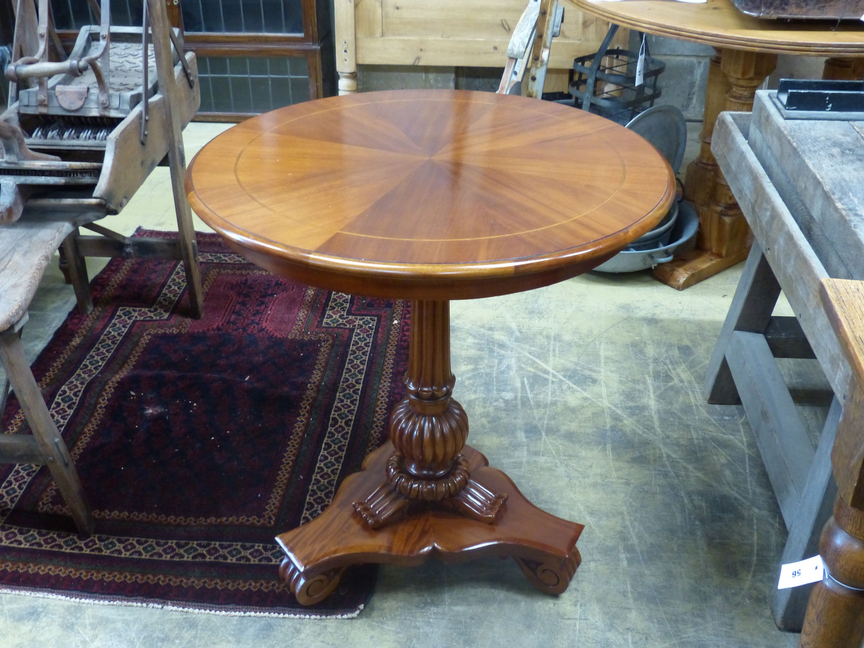 A William IV style mahogany tilt-top centre table